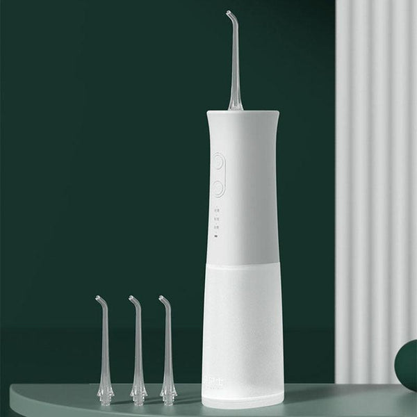 جهاز تنظيف الاسنان بالماء ثلاثة رؤوس - متجر بيوتي سنتر